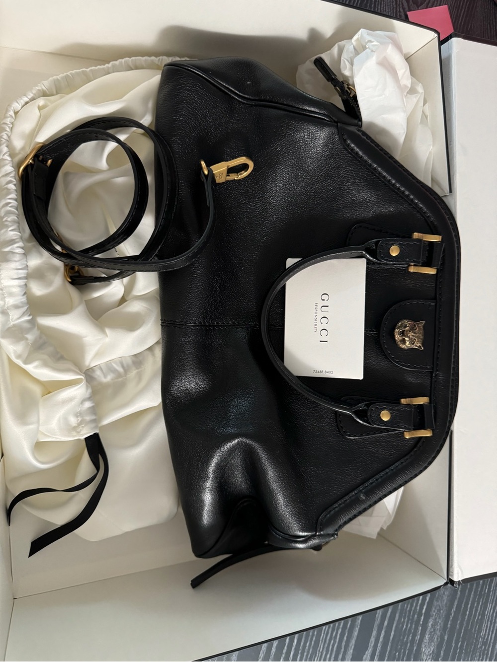 Gucci Black Leather Shoulder Bag with Gold Hardware and Lion Emblem